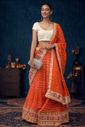 Orange Patchwork Bandhani Art Silk Lehenga Set With Dupatta