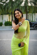Malavika Mohanan In Lime Green Hand-Dyed Plain Chiffon Saree With Hand Block Printed Blouse