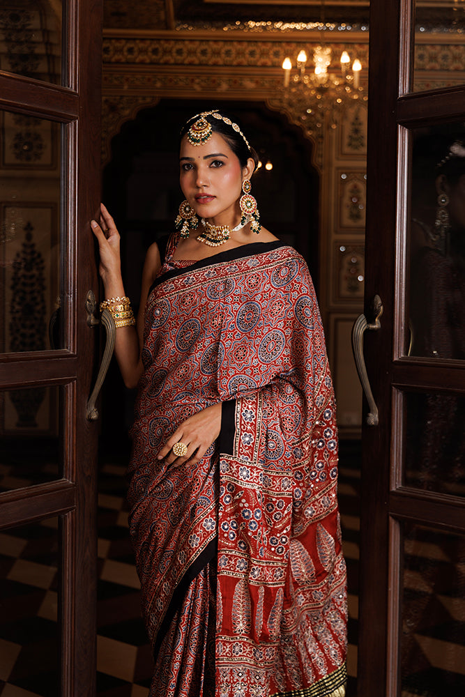 Maroon Ajrakh Hand Block Printed Modal Silk Saree With Aari & Sequins
