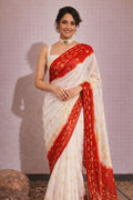 White-Red Georgette Holi Saree with Red Border & Swarovski Work