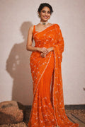 Orange Georgette Tubelight Jaal Work Saree