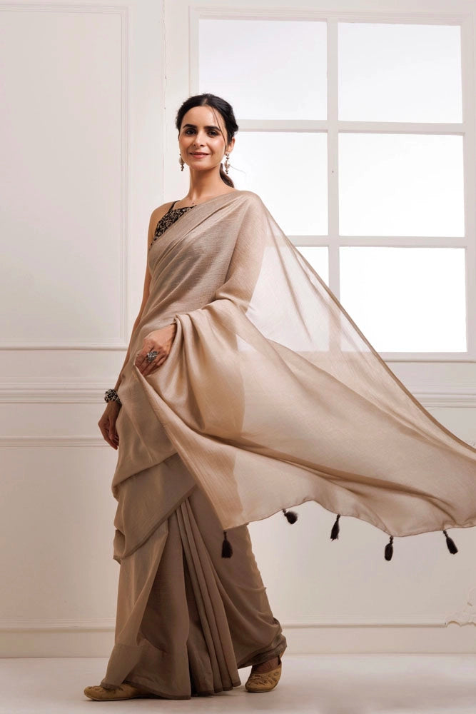 Taupe Solid Silk Textured Saree With Stitched Embroidered Blouse