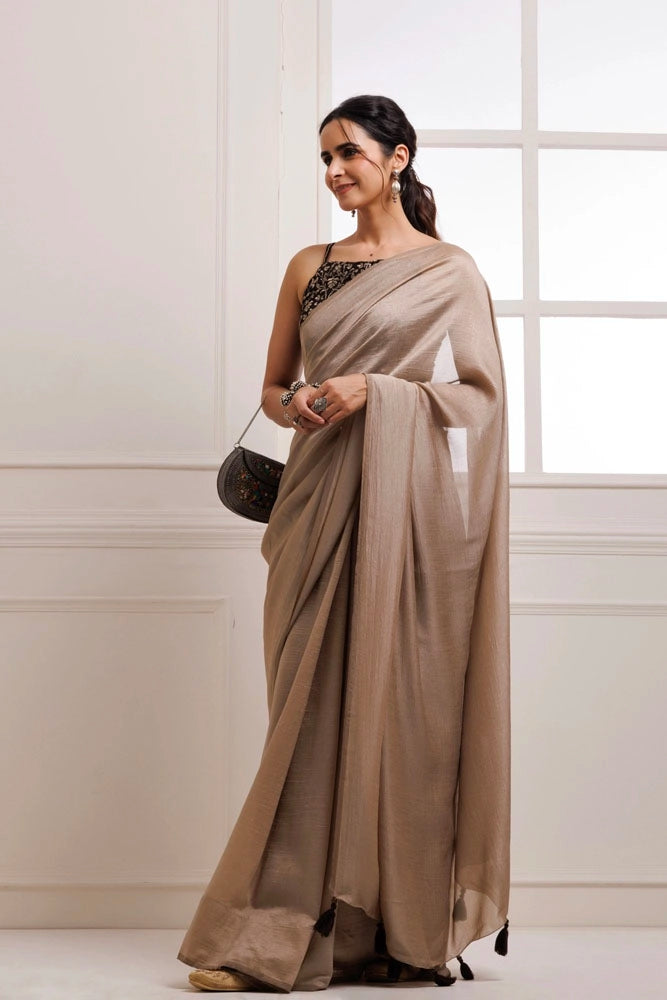 Taupe Solid Silk Textured Saree With Stitched Embroidered Blouse