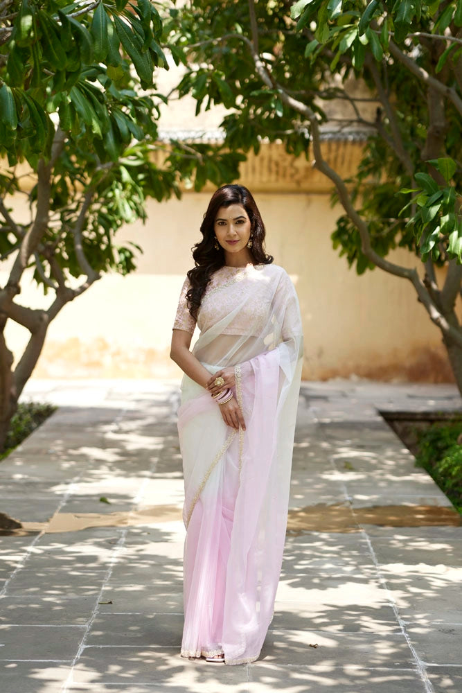 Pastel pink-cream shaded hand embroidered organza saree
