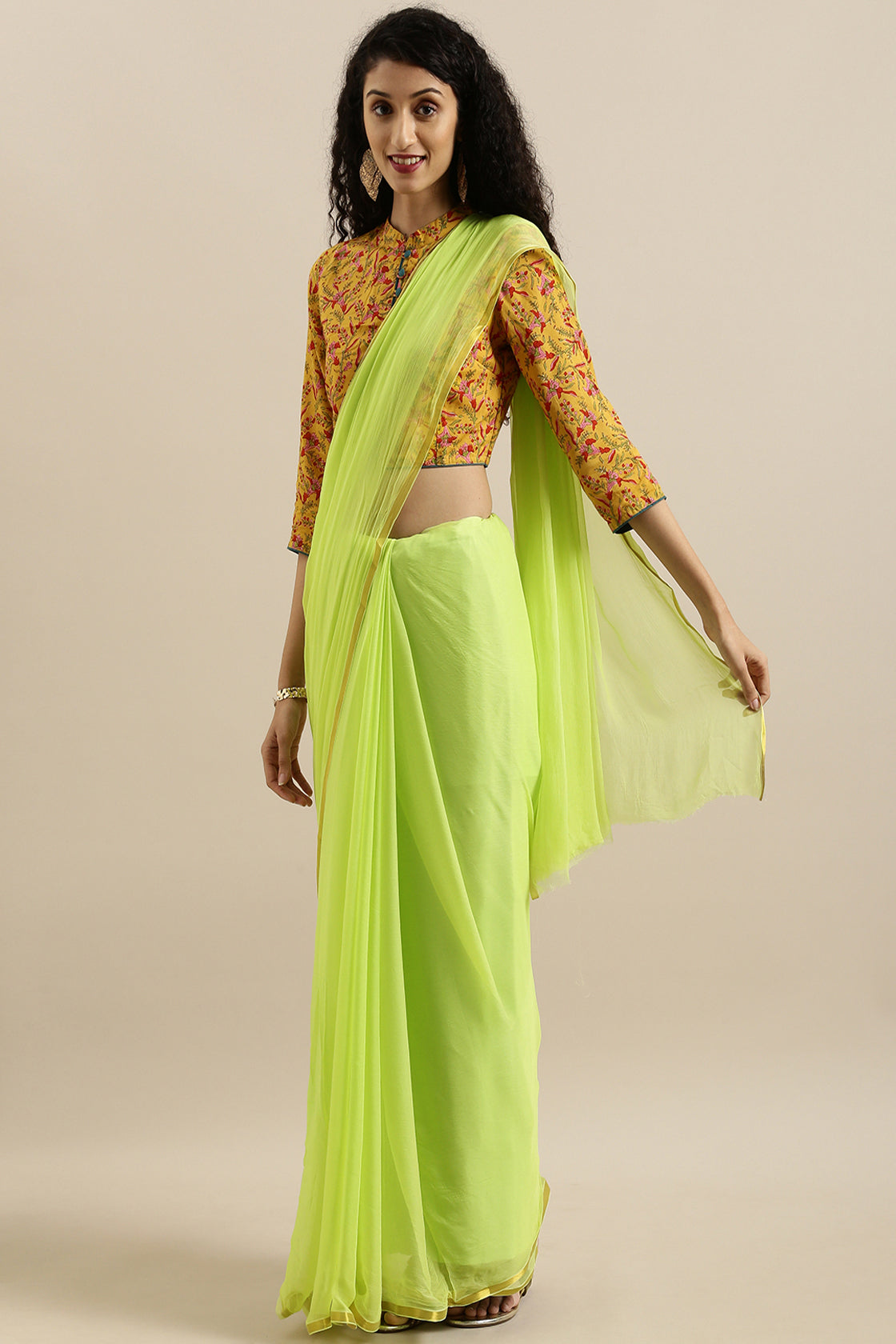Malavika Mohanan In Lime Green Hand-Dyed Plain Chiffon Saree With Hand Block Printed Blouse