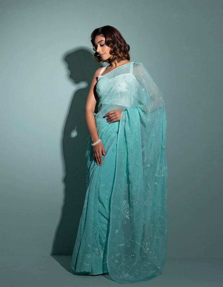Blue handcrafted sequins jaal pure chiffon saree