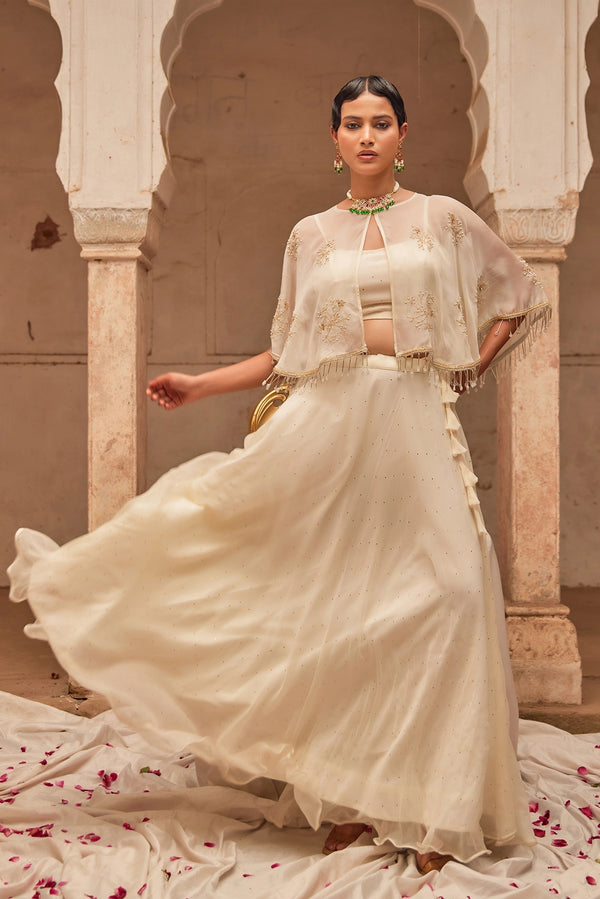 Off White Chiffon Mukaish Lehenga with White Hand Embroidered Cape