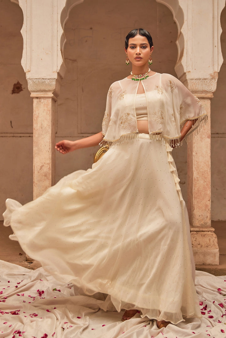 Off White Chiffon Mukaish Lehenga with White Hand Embroidered Cape