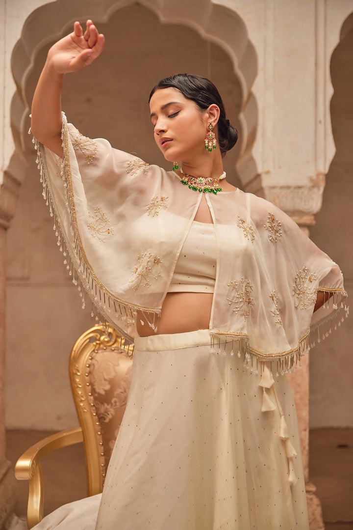 Off White Chiffon Mukaish Lehenga with White Hand Embroidered Cape