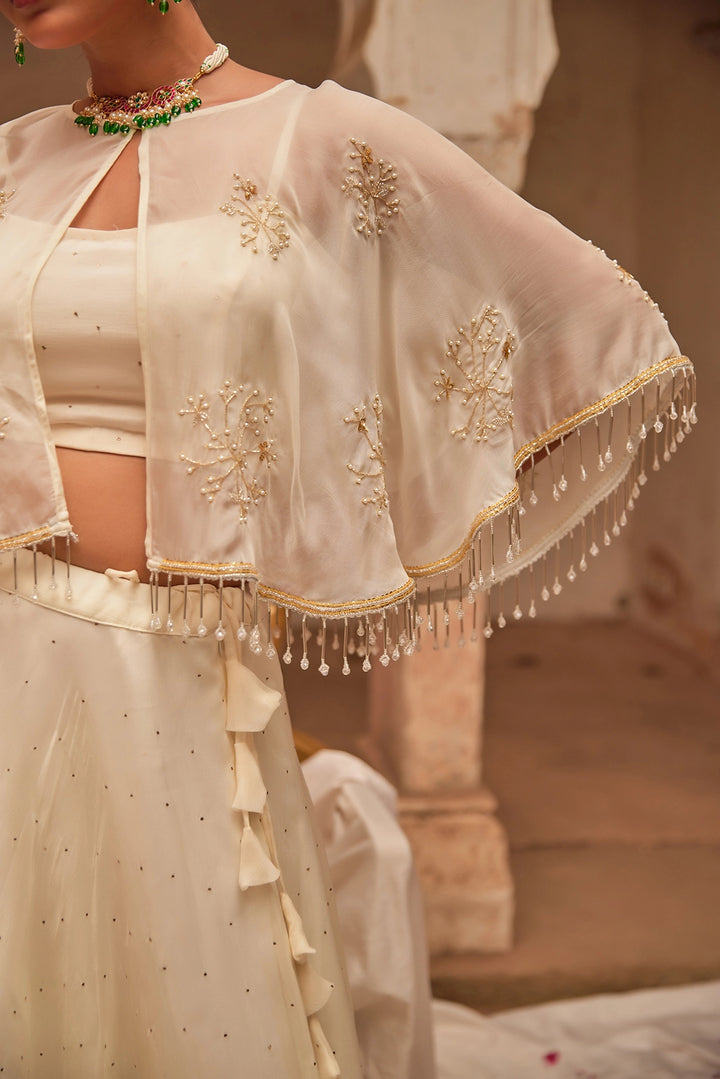 Off White Chiffon Mukaish Lehenga with White Hand Embroidered Cape