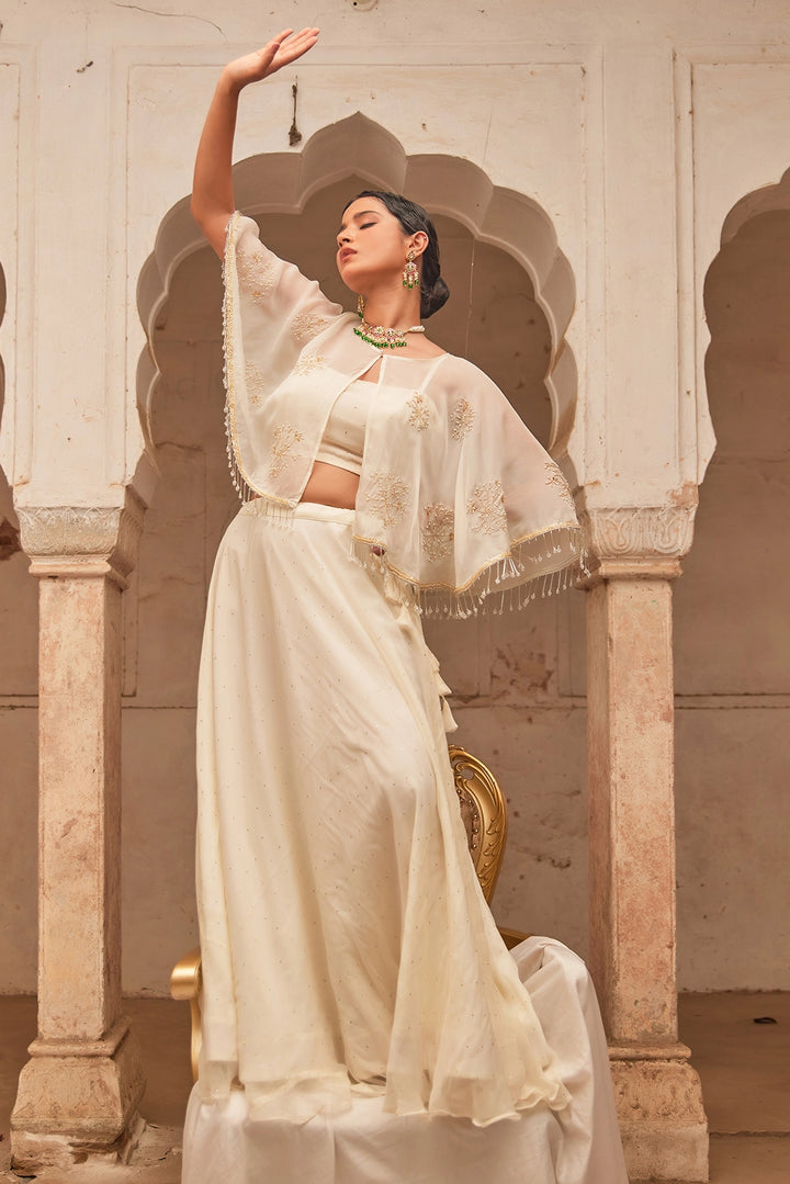Off White Chiffon Mukaish Lehenga with White Hand Embroidered Cape
