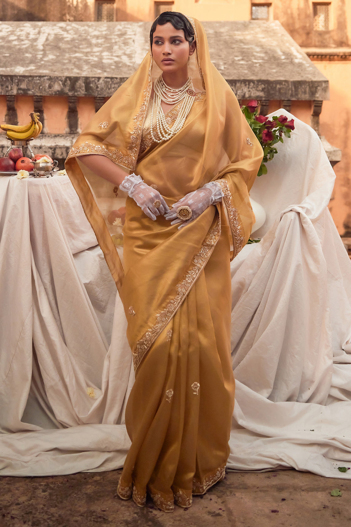 Golden Handwoven Tissue Saree Adorned With Zardozi Embroidery