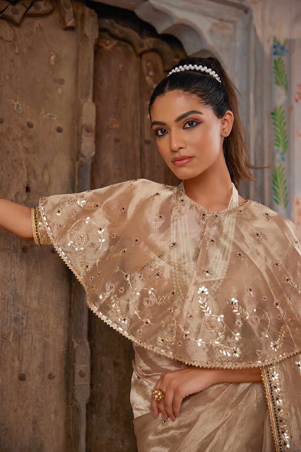 Gold Embellished Pure Tissue Saree With Designer Cape