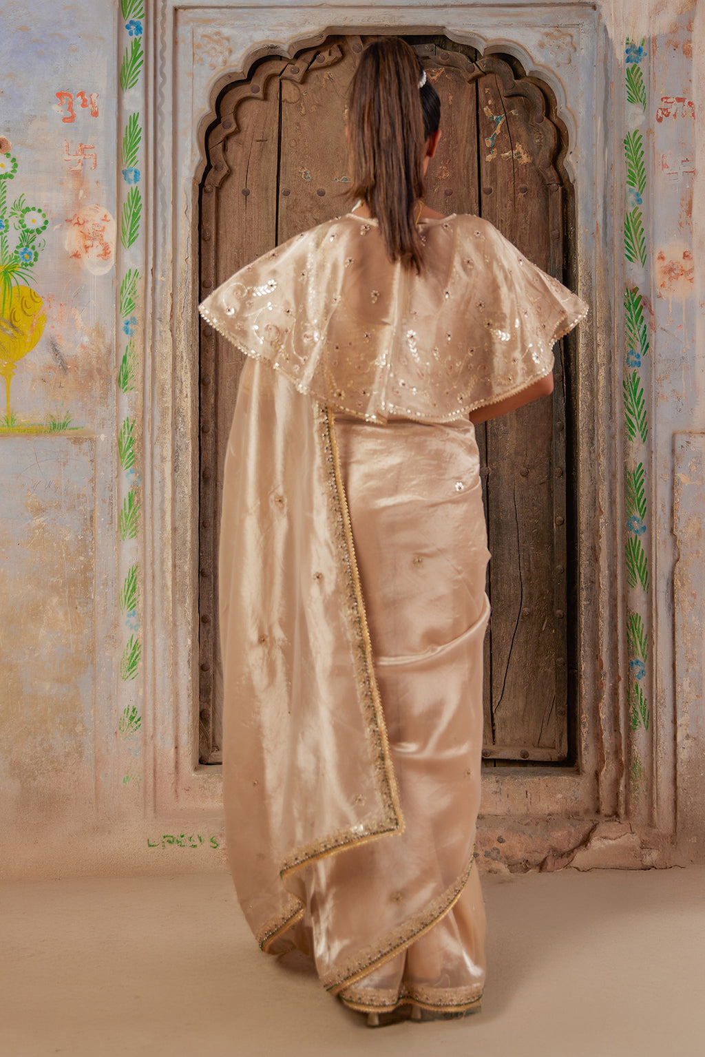 Gold Embellished Pure Tissue Saree With Designer Cape