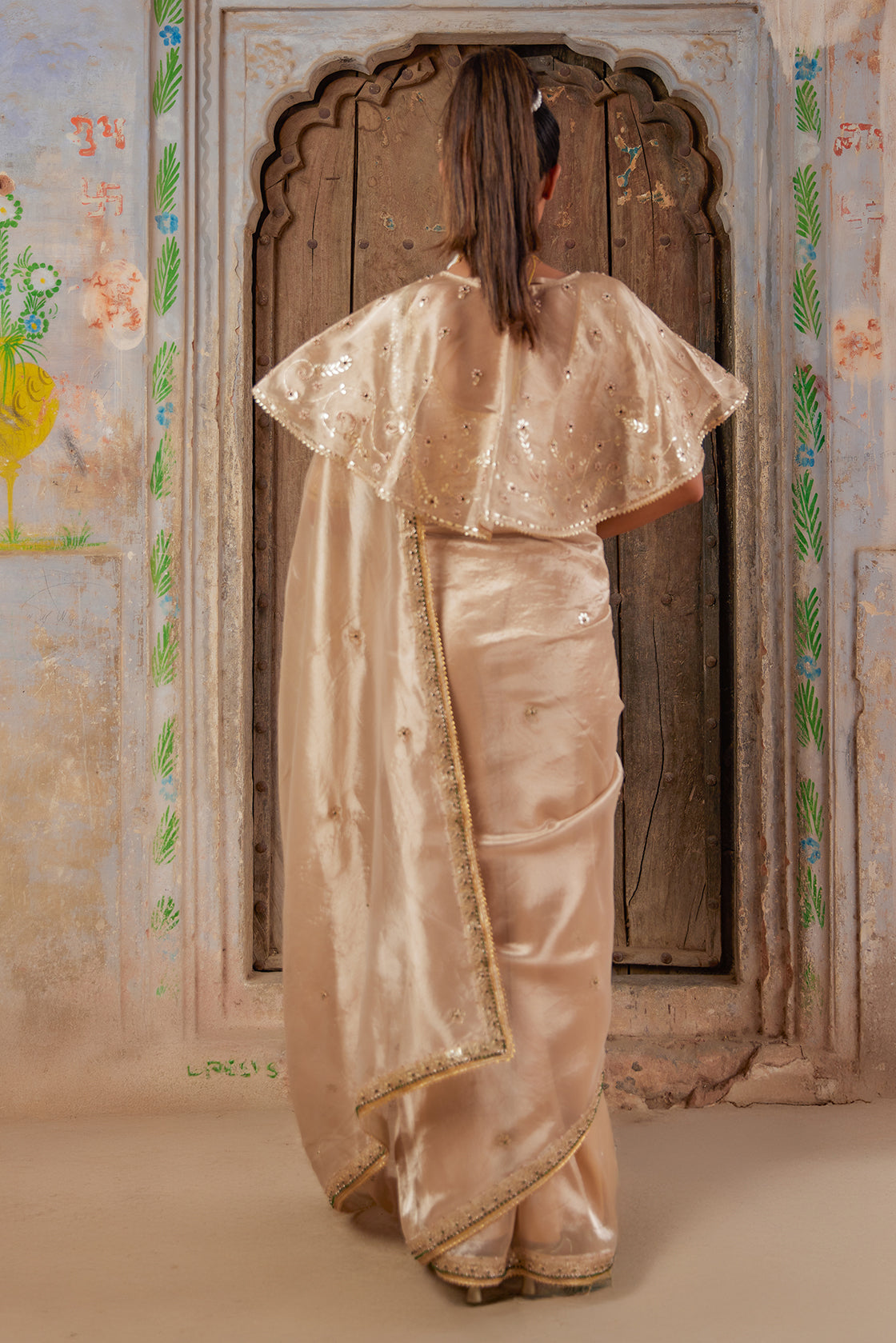 Gold Embellished Pure Tissue Saree With Designer Cape