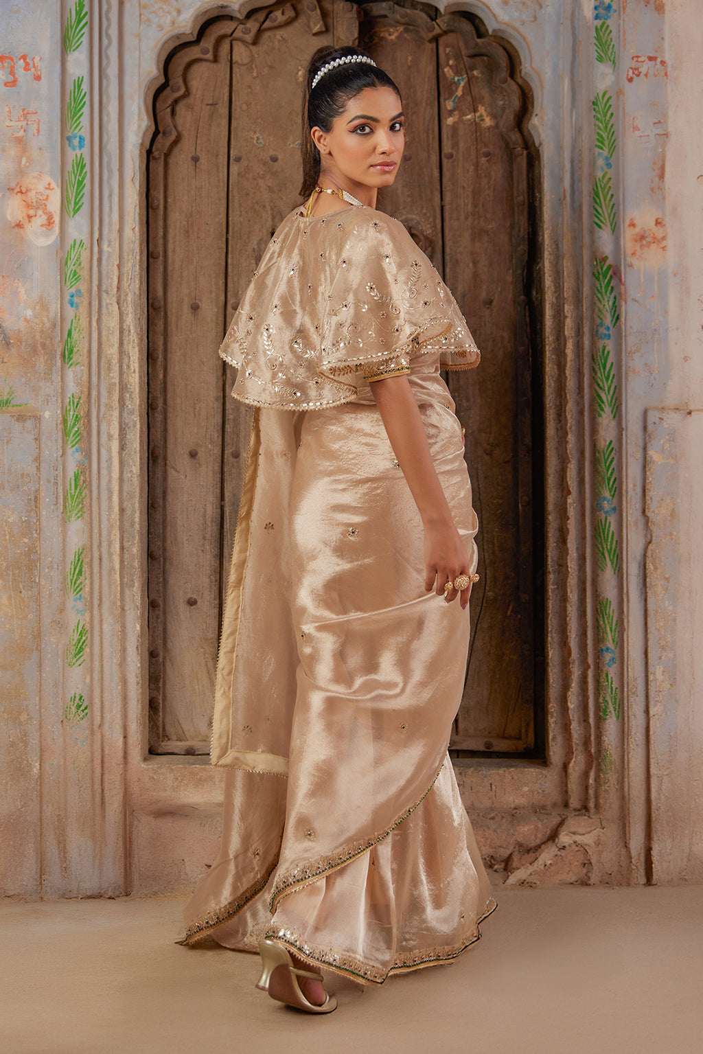 Gold Embellished Pure Tissue Saree With Designer Cape
