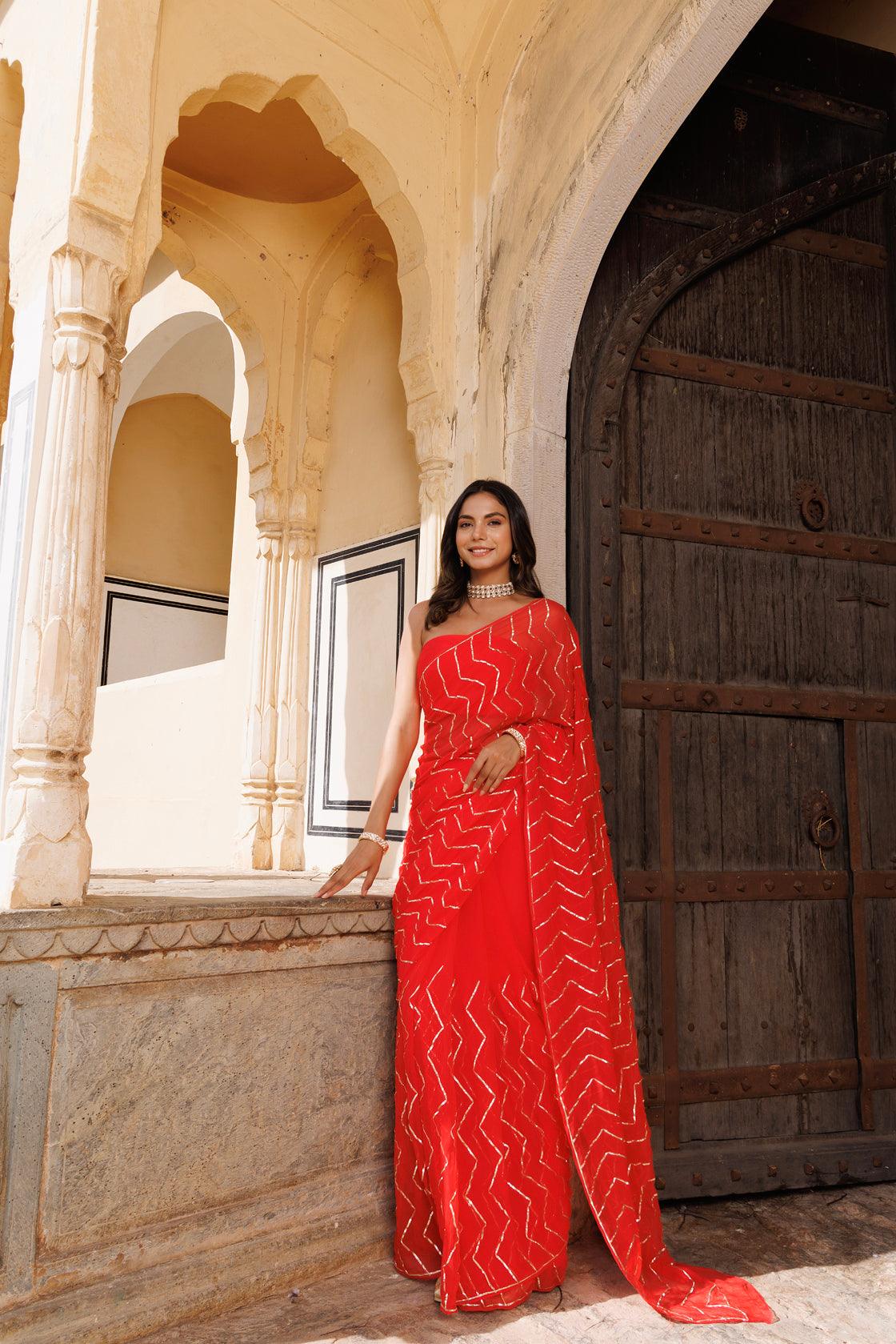 Red authentic Hand Embroidered Saree with Golden Pleated Blouse